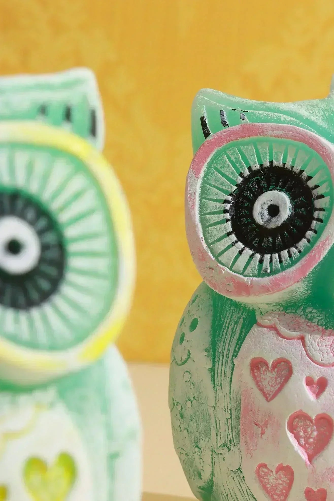 Hootique Owl Couple Candle in Pink and Yellow — close-up view, G Decor