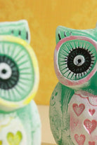 Hootique Owl Couple Candle in Pink and Yellow — close-up view, G Decor