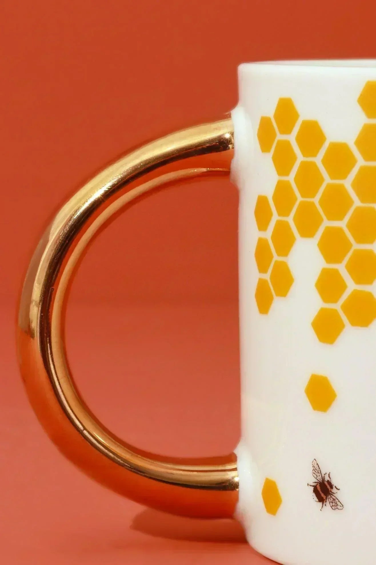 Honeycomb Buzz Gold Handle Ceramic Mug — lifestyle view, G Decor