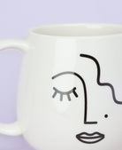 G Decor Mugs and Cups White Large Mug with Abstract Face Design