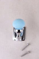 Light blue ceramic ball hook on a chrome finish hook and back plate, with its two chrome finish screws