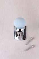Light grey ceramic ball hook, a very pale grey with a cool blue tint, on a chrome finish hook with its two screws