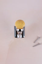 Mustard ochre crackle glaze ceramic ball hook on a chrome finish hook, with its two screws