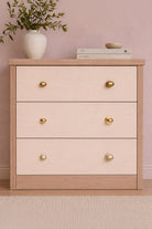 Oval cabinet knob on rose in polished, aged and satin brass, second view