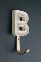 Personalised Cream Crackle Monogram Coat Hook in Antique Brass Finish — close-up view, G Decor