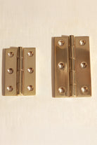 Butt hinge in polished brass, second view