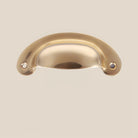 Slim crescent cup pull in polished brass