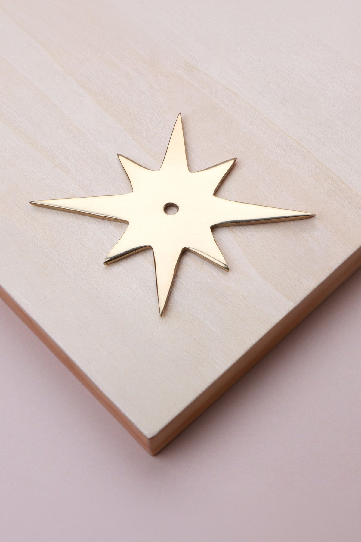 Polished brass star backplate, 87 x 68mm: solid brass with a 4mm centre hole for the knob bolt