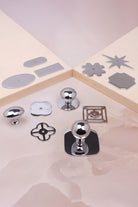 Cabinet knobs and backplates in polished chrome, third view