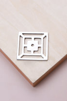 Polished chrome fretwork backplate, 45 x 45mm, an open square fret: chrome-plated solid brass with a 4mm centre hole for the knob bolt