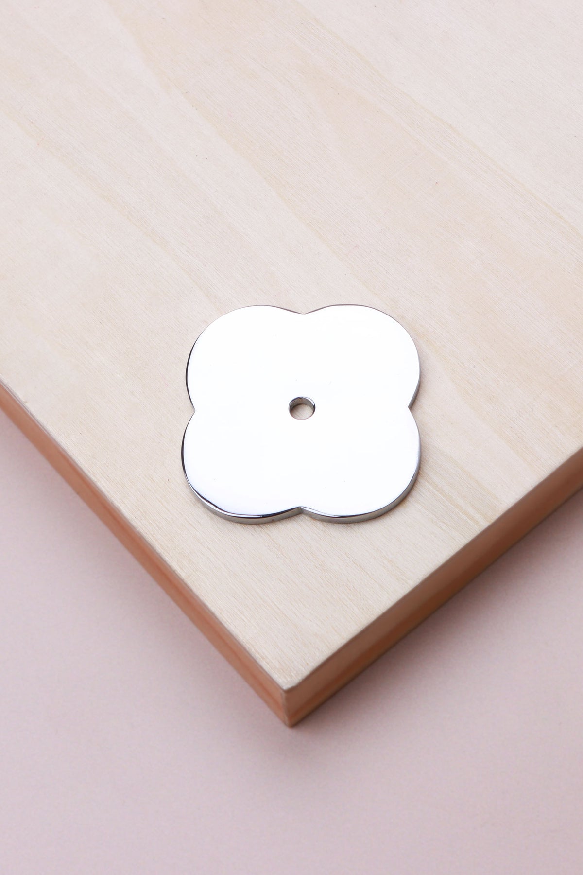 Polished chrome quatrefoil backplate, 42 x 42mm: chrome-plated solid brass with a 4mm centre hole for the knob bolt