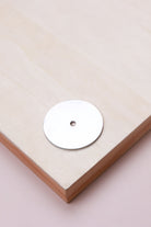 Polished chrome round backplate, 45mm across: chrome-plated solid brass with a 4mm centre hole for the knob bolt