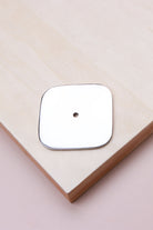 Polished chrome squircle backplate, 60 x 60mm with softly rounded sides: chrome-plated solid brass with a 4mm centre hole for the knob bolt