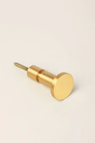 Prestige Satin Brass Wall Hook — lifestyle view, G Decor