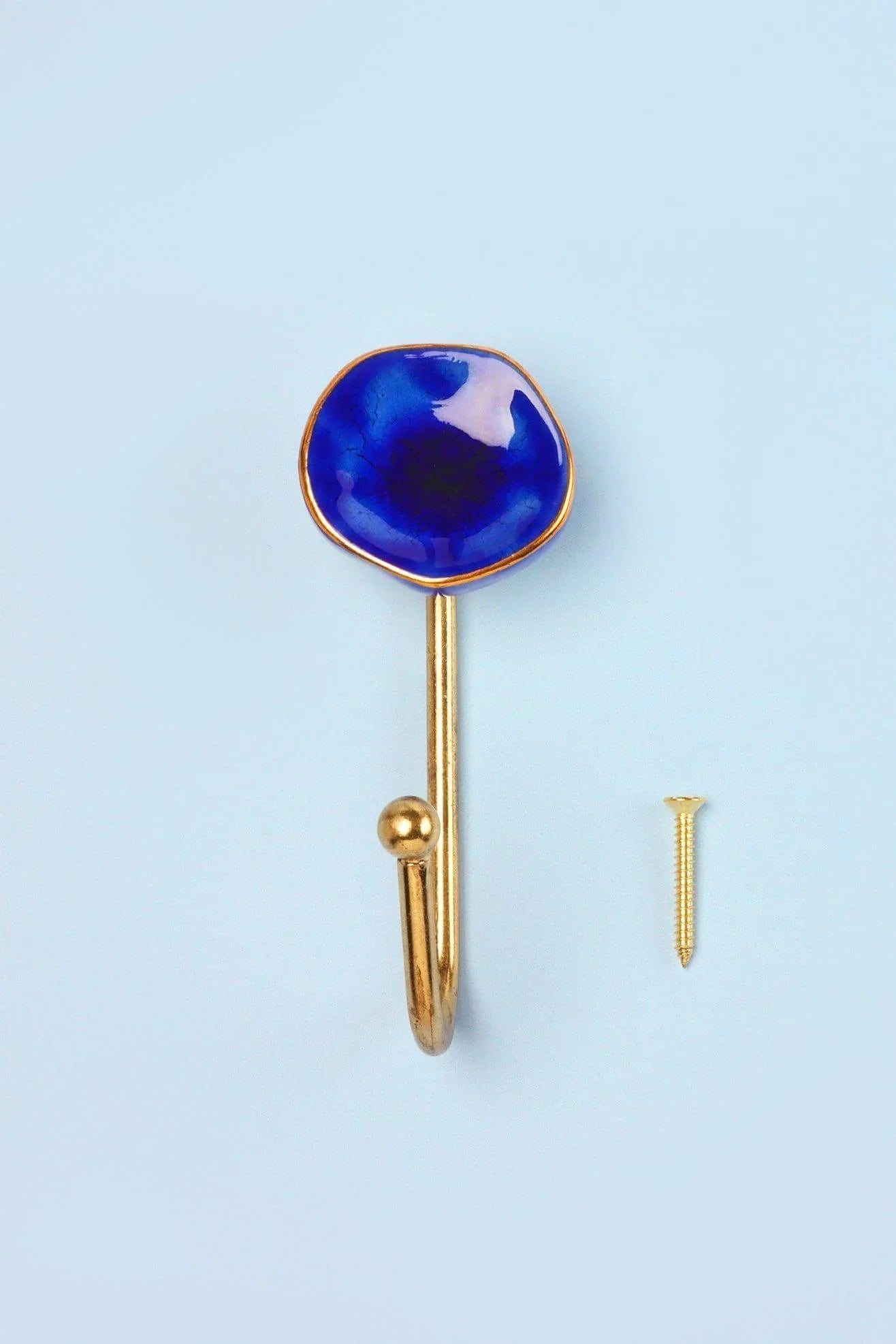 Rhodes Family Ceramic Wall Hook in Crackle Glaze with Brass — close-up view, G Decor