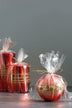 Roselane Mirror Glass Pillar Candle in Crimson Red with Gold Stripe — close-up view, G Decor