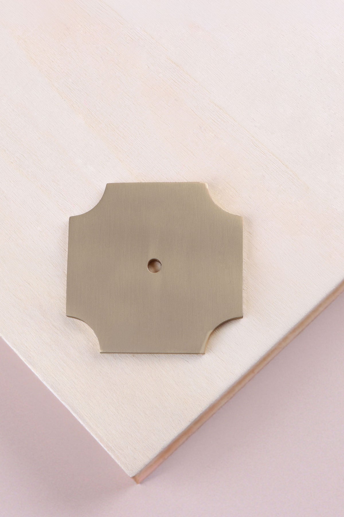 Satin brass square backplate, 50 x 50mm with scooped corners: solid brass with a 4mm centre hole for the knob bolt