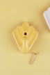 Yellow scallop shell ceramic wall hook, a warm butter yellow, with its brass screw