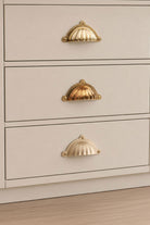 Scalloped cup pull in polished, aged and satin brass, second view