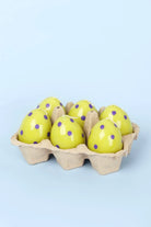 Green Easter Polka Egg Candles in Spring Meadow — close-up view, G Decor