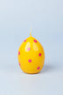 Yellow Easter Polka Egg Candles in Sunny Barnyard — close-up view, G Decor