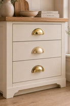 Slim crescent cup pull in polished, aged and satin brass
