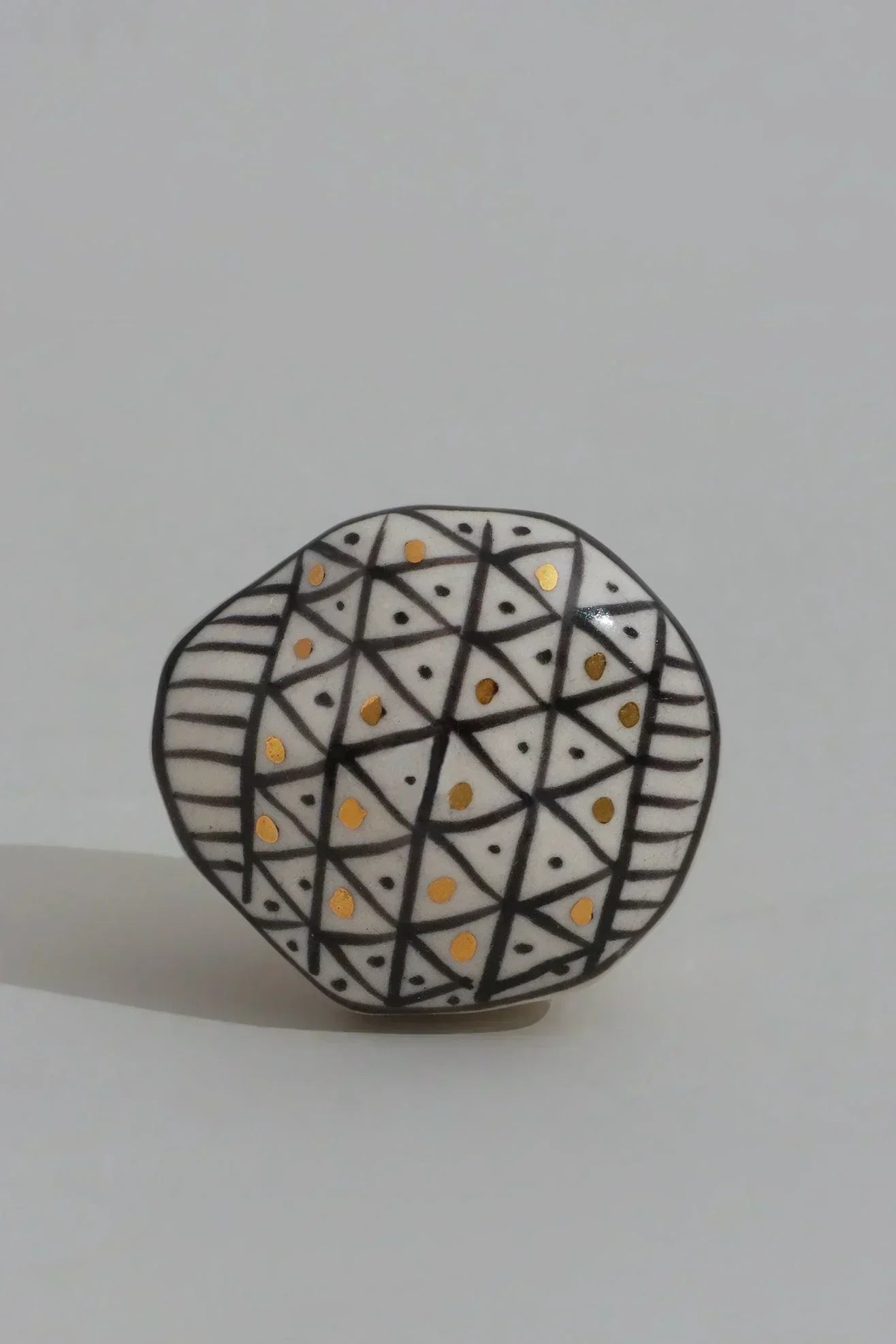 Sorrento Hand-Painted Designer Ceramic Cabinet Knob in Gold — lifestyle view, G Decor