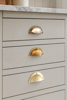 Stepped rim cup pull in polished, aged and satin brass, second view