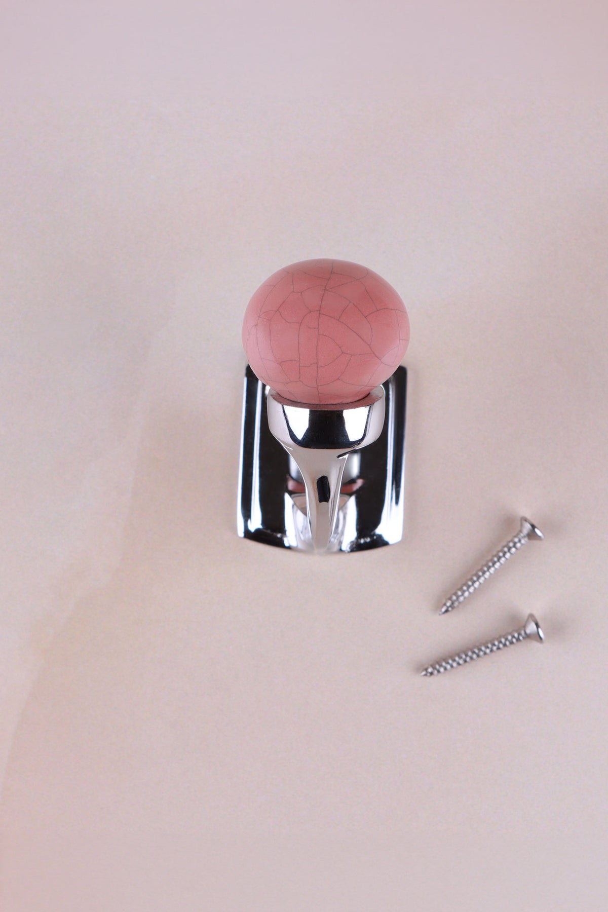 Terracotta crackle glaze ceramic ball hook on a chrome finish hook, with its two screws