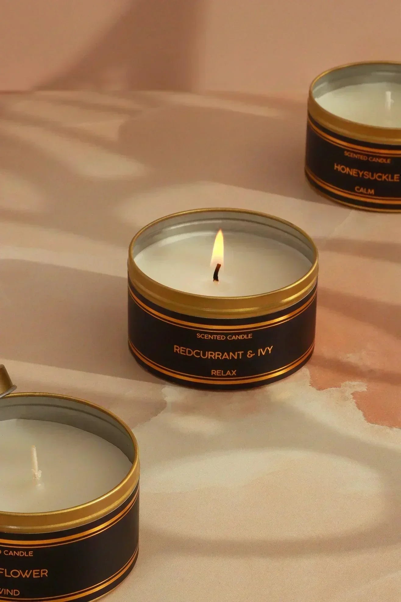 Tranquessence Scented Tin Candle in Black and Gold — close-up view, G Decor