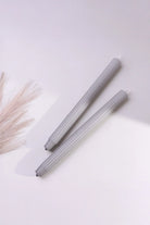 Velluto Cenere Pair of Ash Grey Ribbed Velvet Taper Candles — close-up view, G Decor