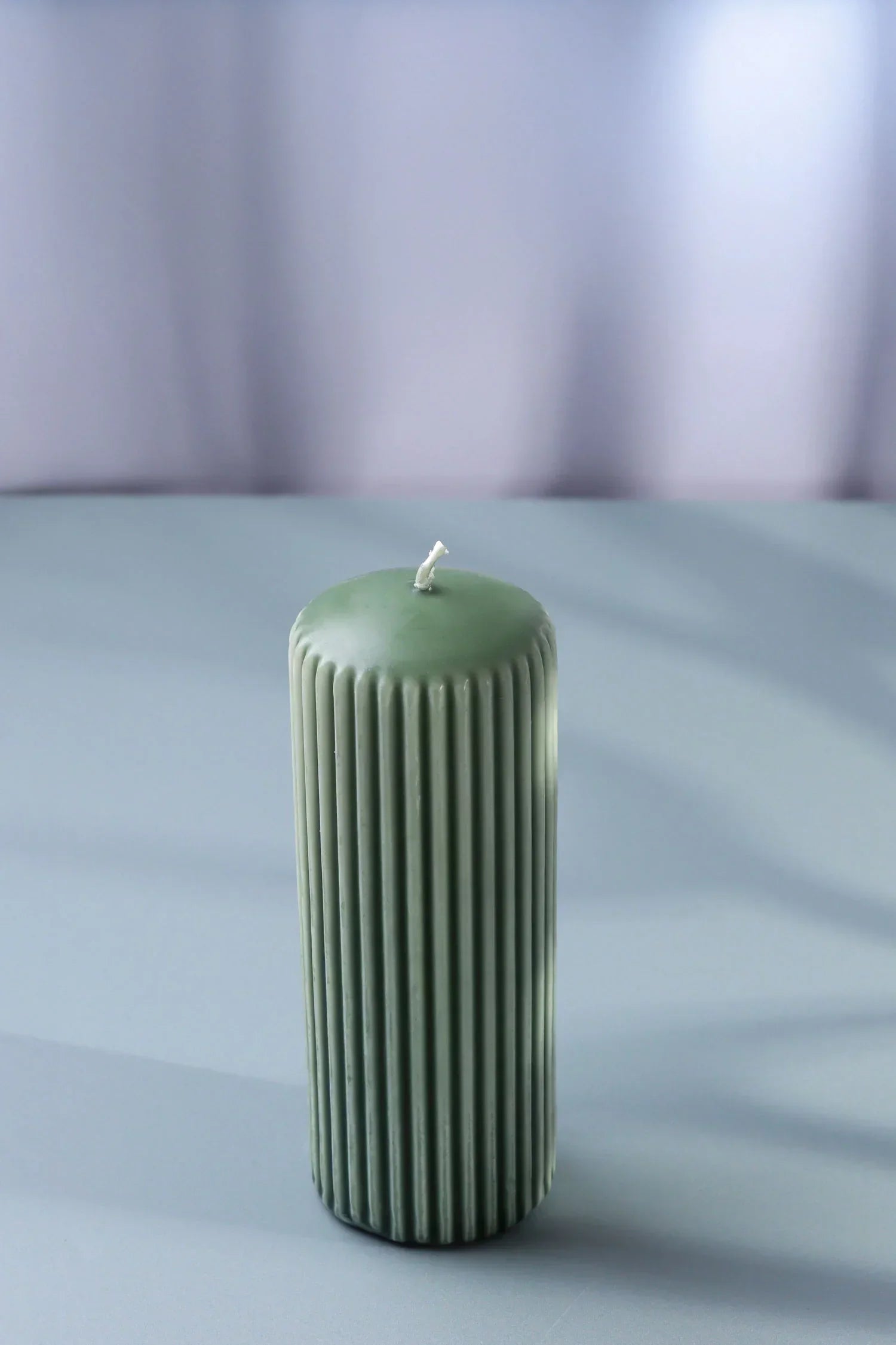 Velluto Oliva Ribbed Velvet Pillar Candle in Olive Green — close-up view, G Decor