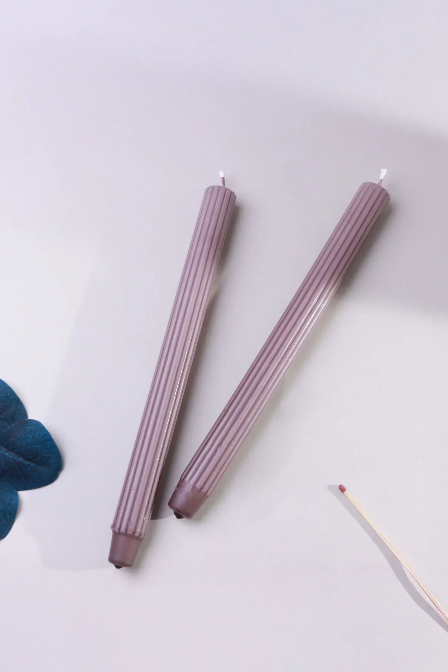 Velluto Prugna Profonda Pair of Deep Plum Ribbed Velvet Taper Candles — close-up view, G Decor