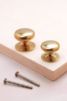 Victorian cabinet knob in aged brass, 32mm and 38mm, with solid brass fixing bolts