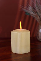 Vellure Ribbed Pillar Candle in Sandstone Yellow — close-up view, G Decor