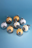 Sunny Yellow Hand-Painted Ceramic Cabinet Knobs, Set of 8 — close-up view, G Decor