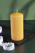 Velluto Sculpted Daffodil Yellow Ribbed Pillar Candle in a Velvet Matte Finish