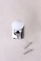 White ceramic ball hook on a chrome finish hook and back plate, with its two chrome finish screws