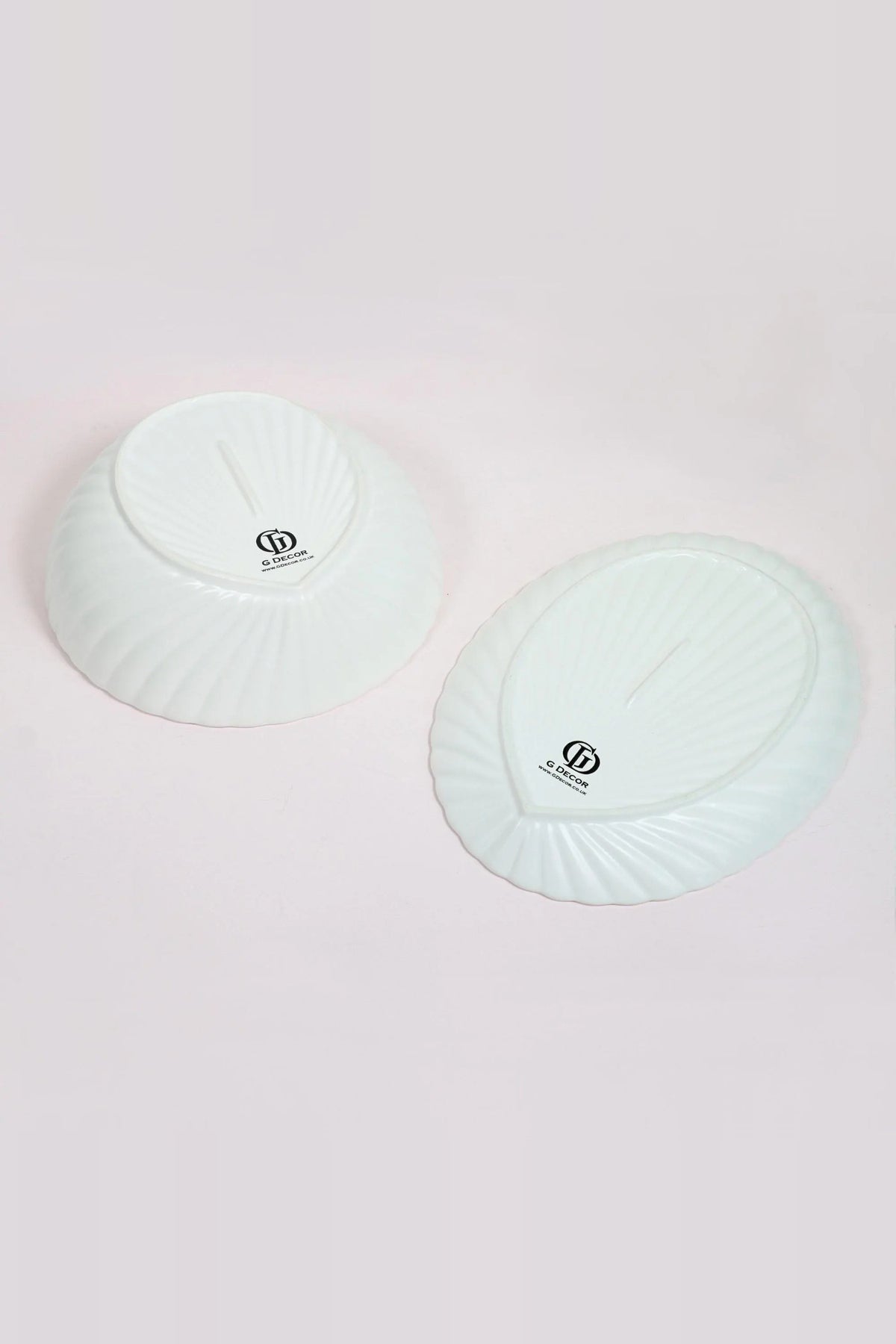 Underside of the shell bowl and the oval dish showing the G Decor stamp
