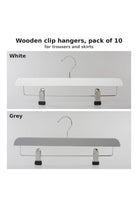 Wooden clip hangers for trousers and skirts, pack of 10, shown in white and in grey