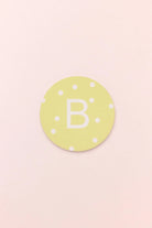 Personalised White Polka Dot Monogram Ceramic Coaster with Cork Base — close-up view, G Decor