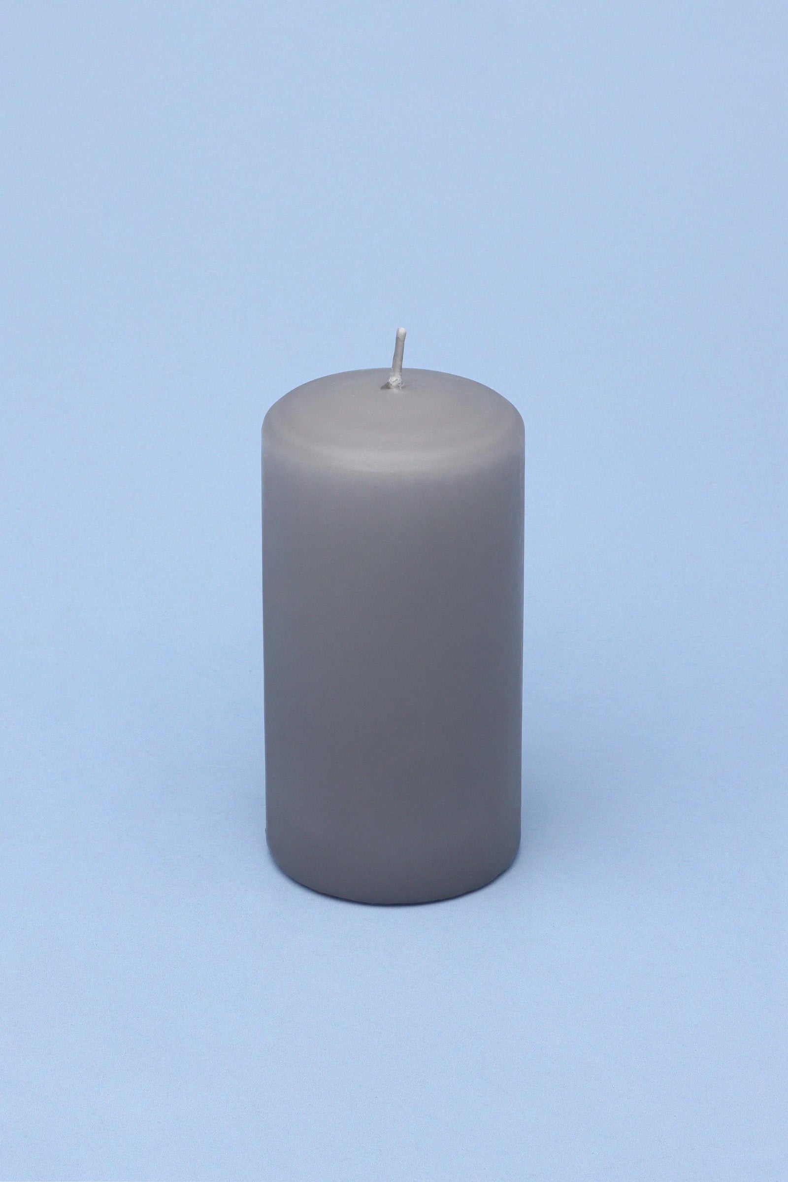 Stillness in Stone Nordic Matte Pillar Candles in Grey and White — close-up view, G Decor