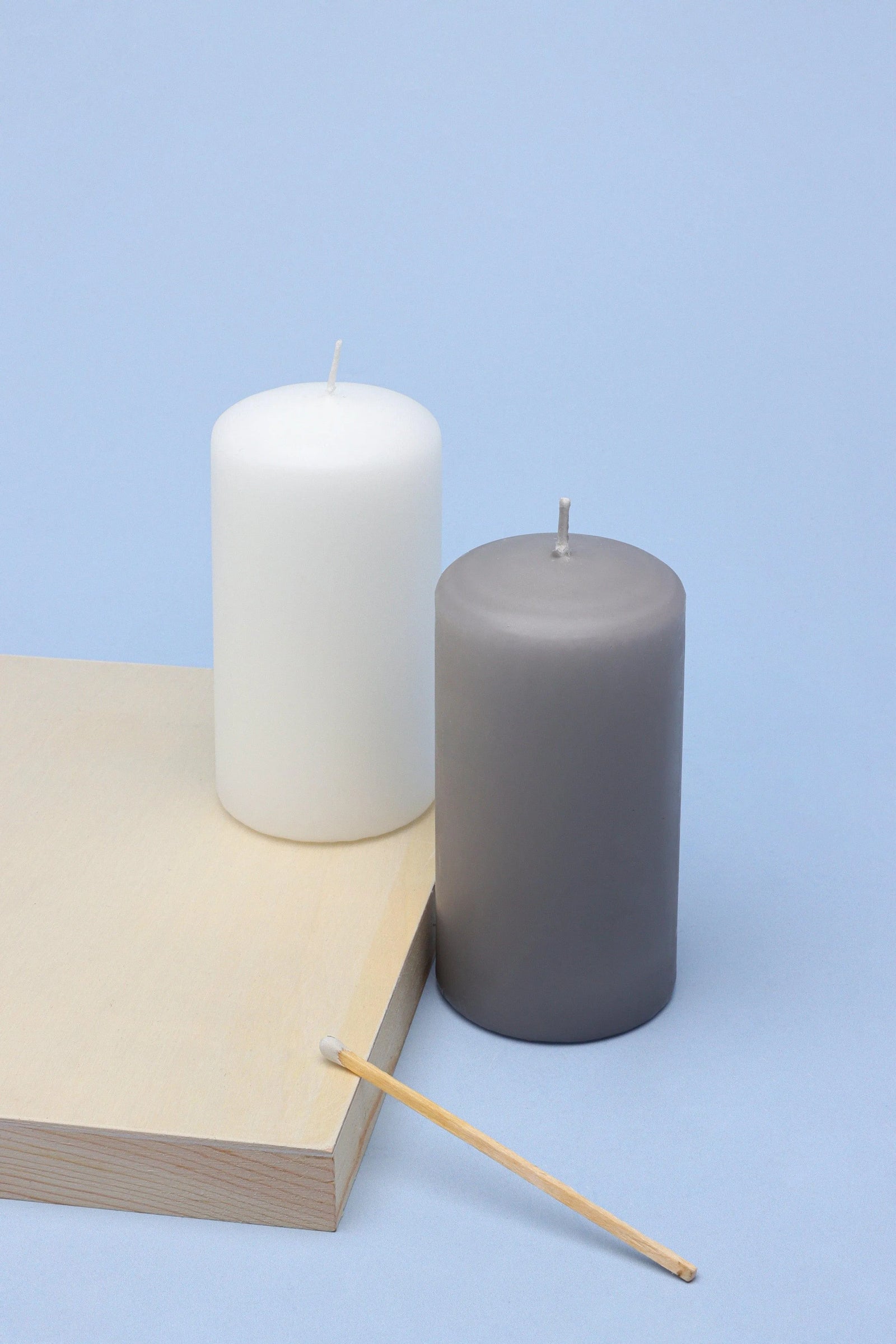 Stillness in Stone Nordic Matte Pillar Candles in Grey and White — G Decor