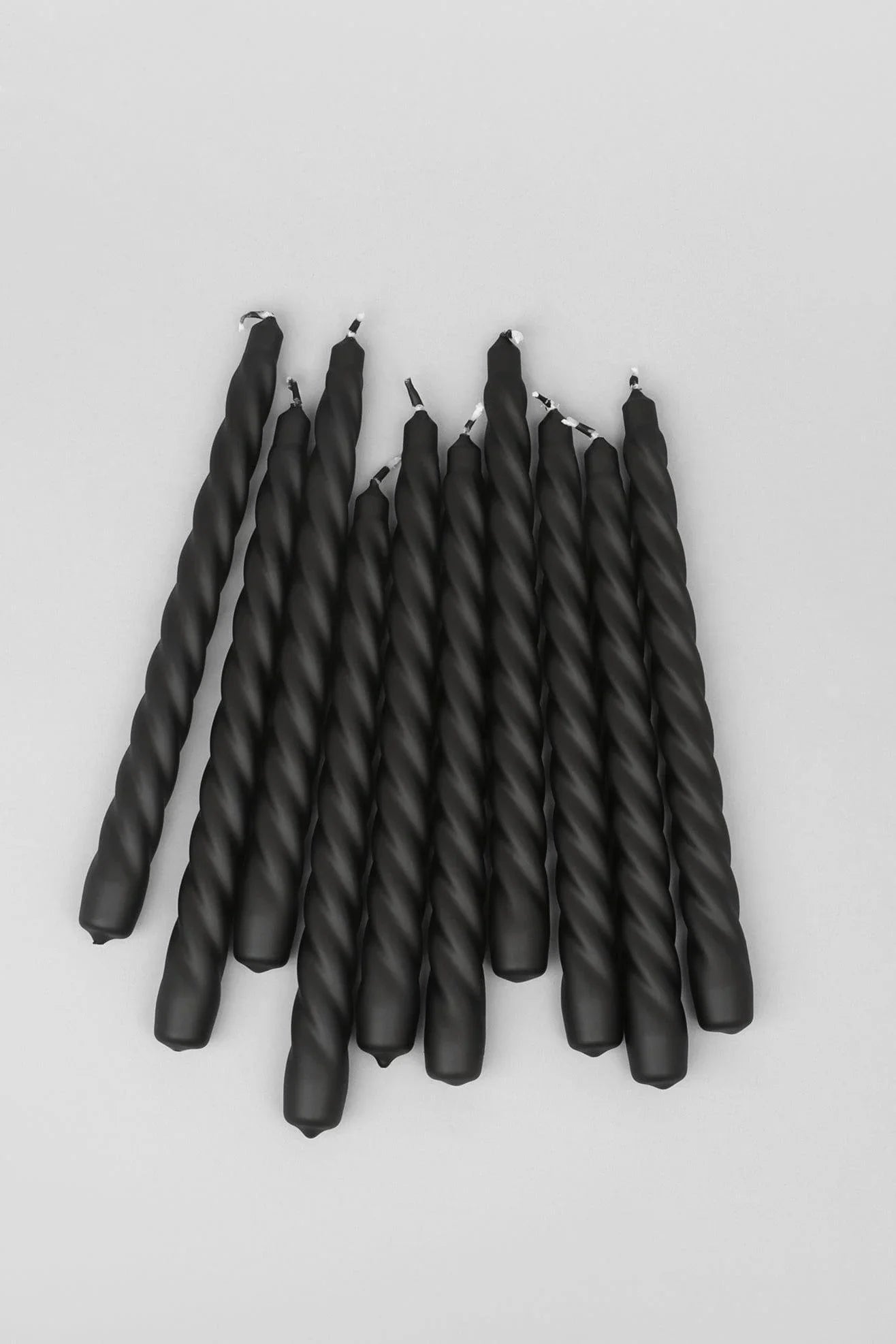 Coraline Nocturra Matte Black Twisted Taper Candles — close-up view, G Decor