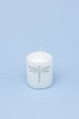 Dragonfly Queen White Pillar Candle with Silver Emblem — close-up view, G Decor