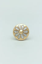 Mother-of-pearl cabinet knob with polished brass detail close-up — G Decor