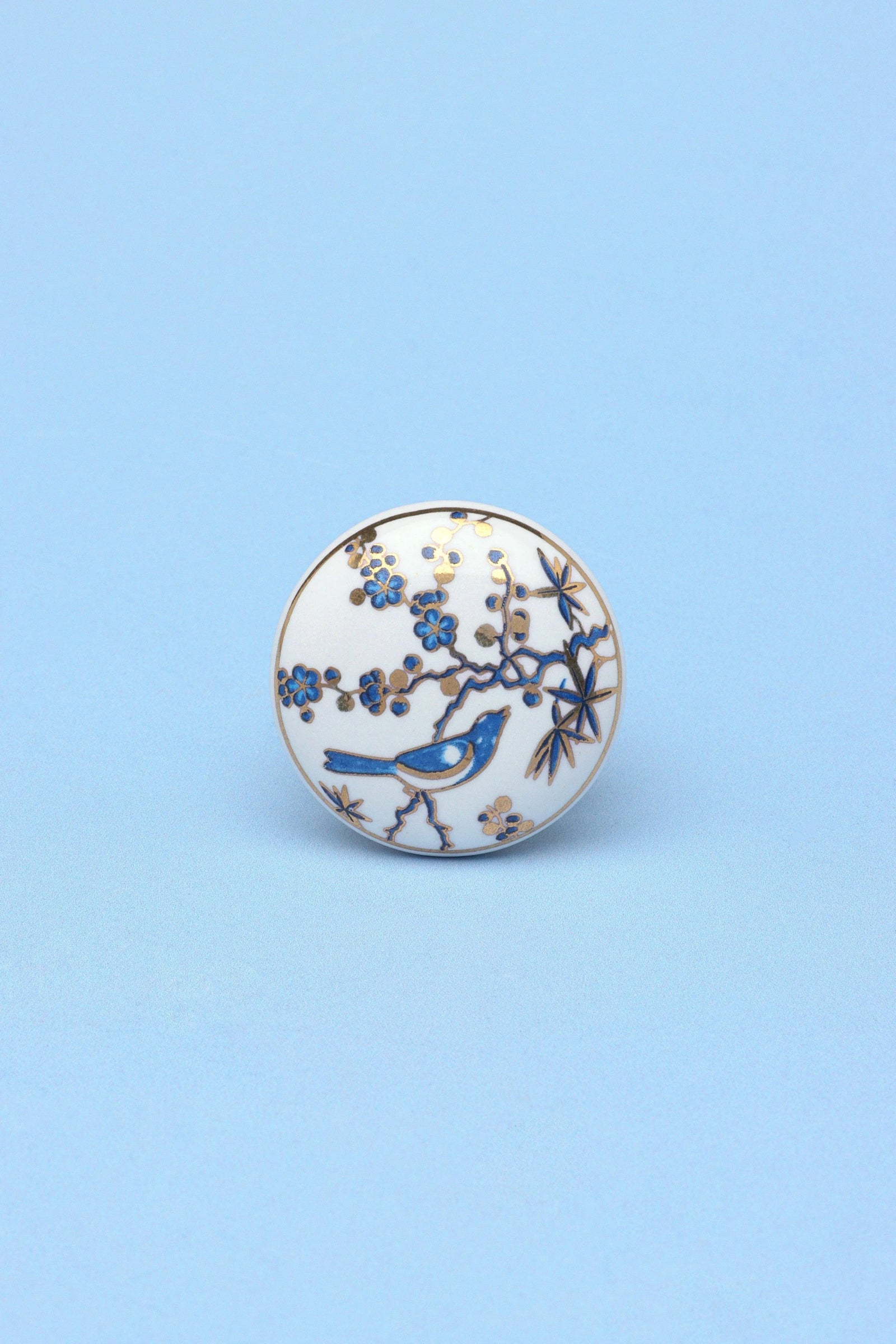 Singing Birds Ceramic Cabinet Knob in Pink and Blue — close-up view, G Decor