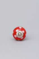 Polka Dot Ceramic Cabinet Knob in Red Light Green and Orange — lifestyle view, G Decor