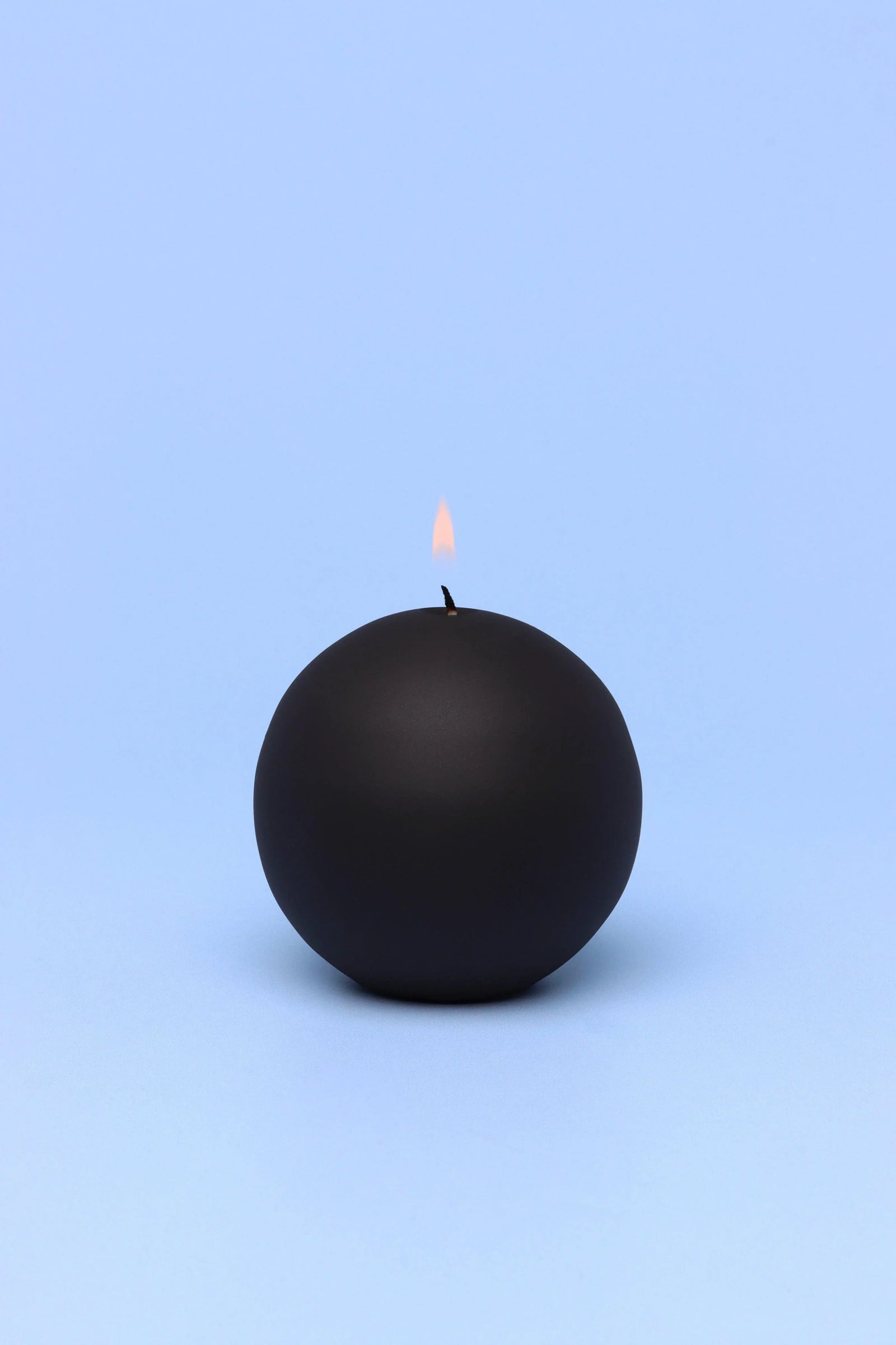 Henry Velvet Matte Soft Touch Pillar Candle in Black — lifestyle view, G Decor