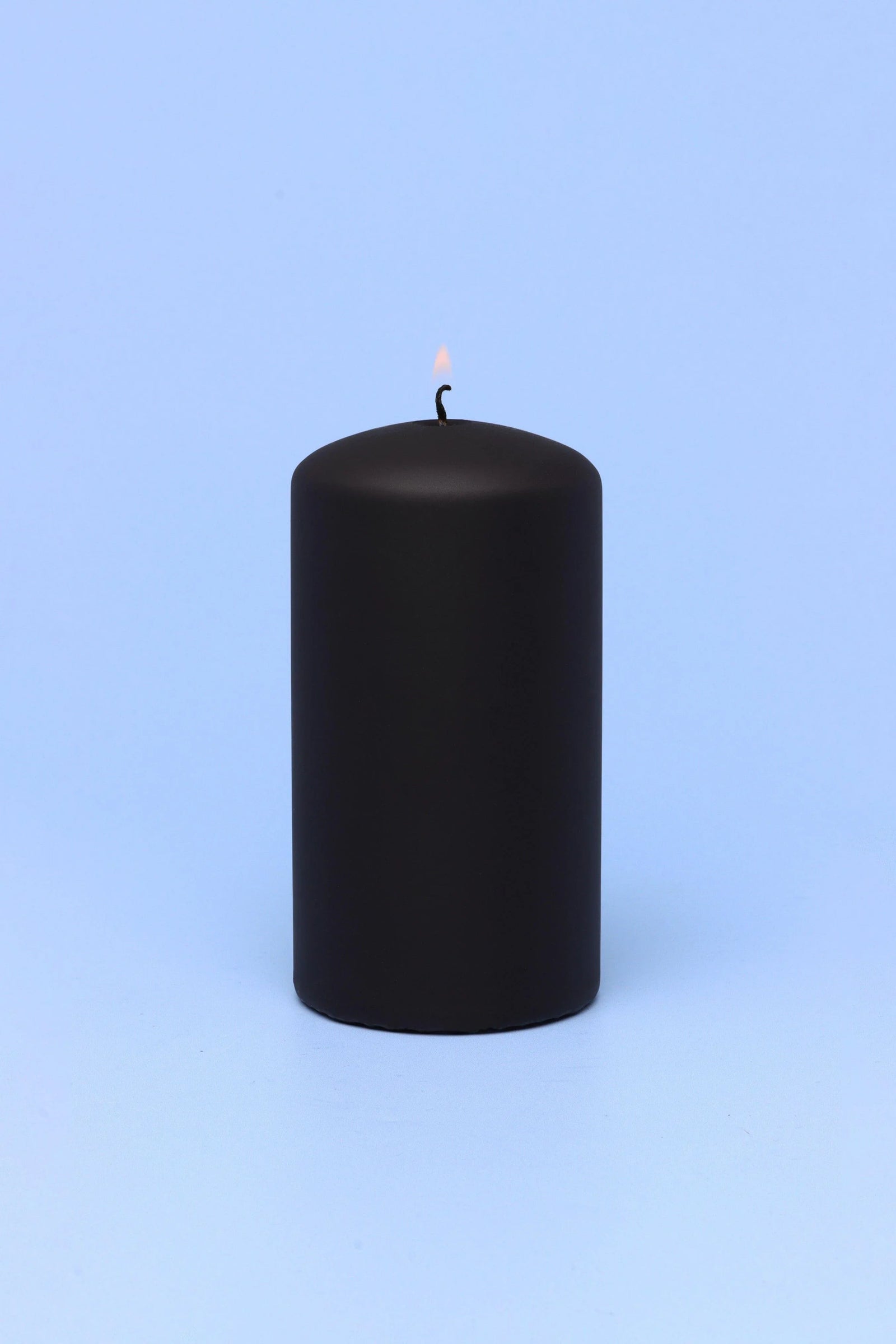 Henry Velvet Matte Soft Touch Pillar Candle in Black — close-up view, G Decor